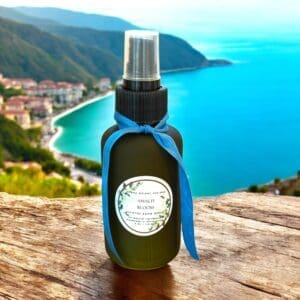 Amalfi Bloom luxury room spray with elegant vessel and ribbon detail